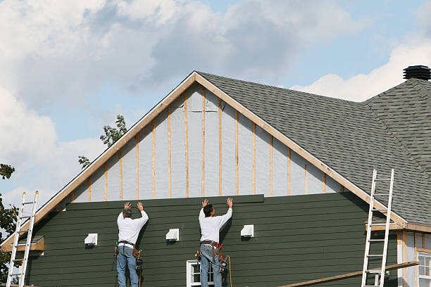 Professional Siding Installation technician working in Englewood, OH